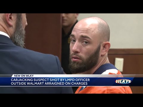 Carjacking suspect shot by LMPD officer pleads not guilty