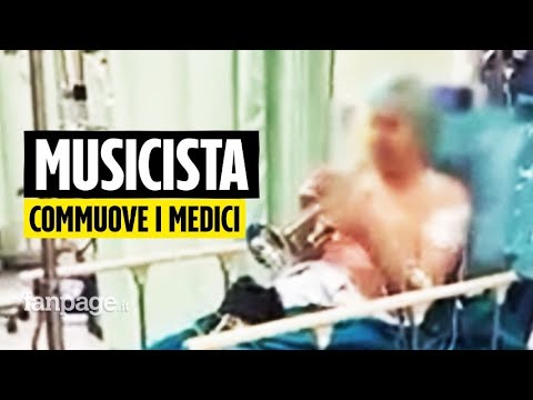 Musicista esce dalla sala operatoria suonando la tromba: brano di Morricone per medici e infermieri