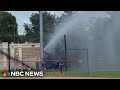 Maryland firefighters charged after flooding baseball field