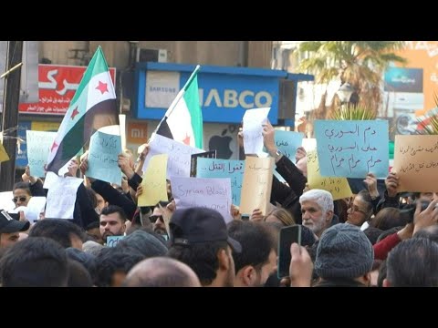 Syria security forces disperse rival protests in Damascus | AFP