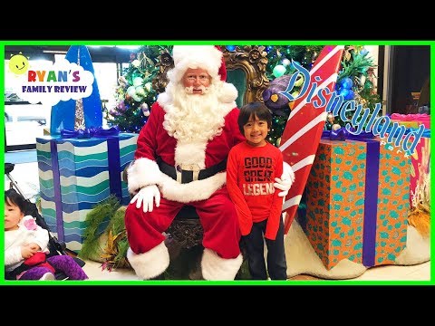 Ryan and Babies first time meeting the real Santa Claus at Disney!