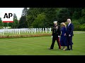 Biden honors US war dead with a cemetery visit ending a French trip that served as a rebuke to Trump