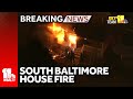 SkyTeam 11 over a house fire in south Baltimore