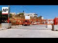 Israel has erected nearly 1,000 barriers in the occupied West Bank, AP explains