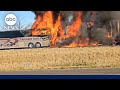 Charter bus carrying students crashes and bursts into flames