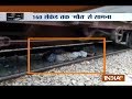 Shocking video shows daring rescue of man lying on rail tracks