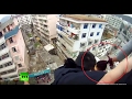 Dramatic Video: Man saves suicidal wife from falling to death by grabbing her hair