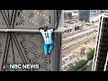 Watch: Climber (almost) scales 30-story building without safety gear