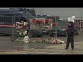 Mourners lay flowers for the victims at the site of terror attack in Moscow  - 00:49 min - News - Video