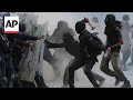 Protesters and police clash during march commemorating 1968 Mexico massacre