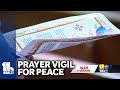 Baltimoreans hold hold prayer vigil for peace in Ukraine
