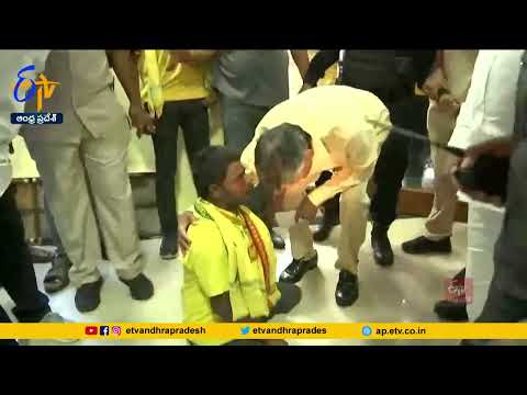 Chandrababu sits on the ground with polio affected party worker; offers financial help