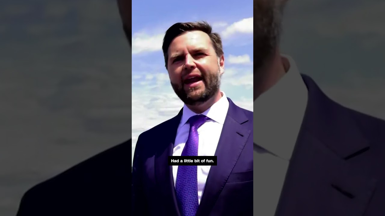 JD Vance approaches Kamala Harris' Air Force Two