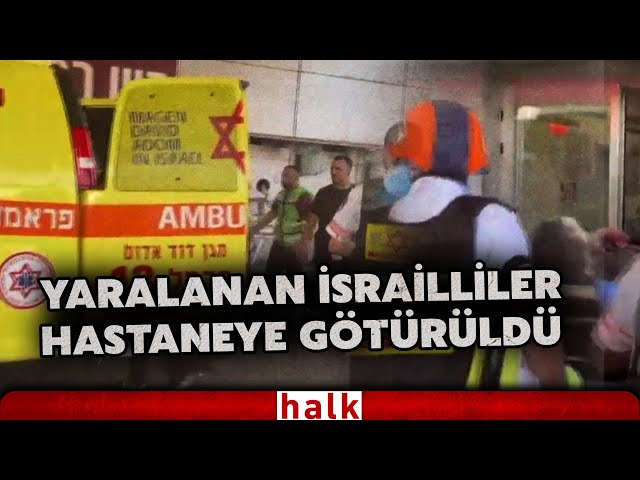 İran’ın Hayfa’ya füze saldırısı sonucu yaralanan İsrailliler, ambulanslarla hastaneye götürüldü