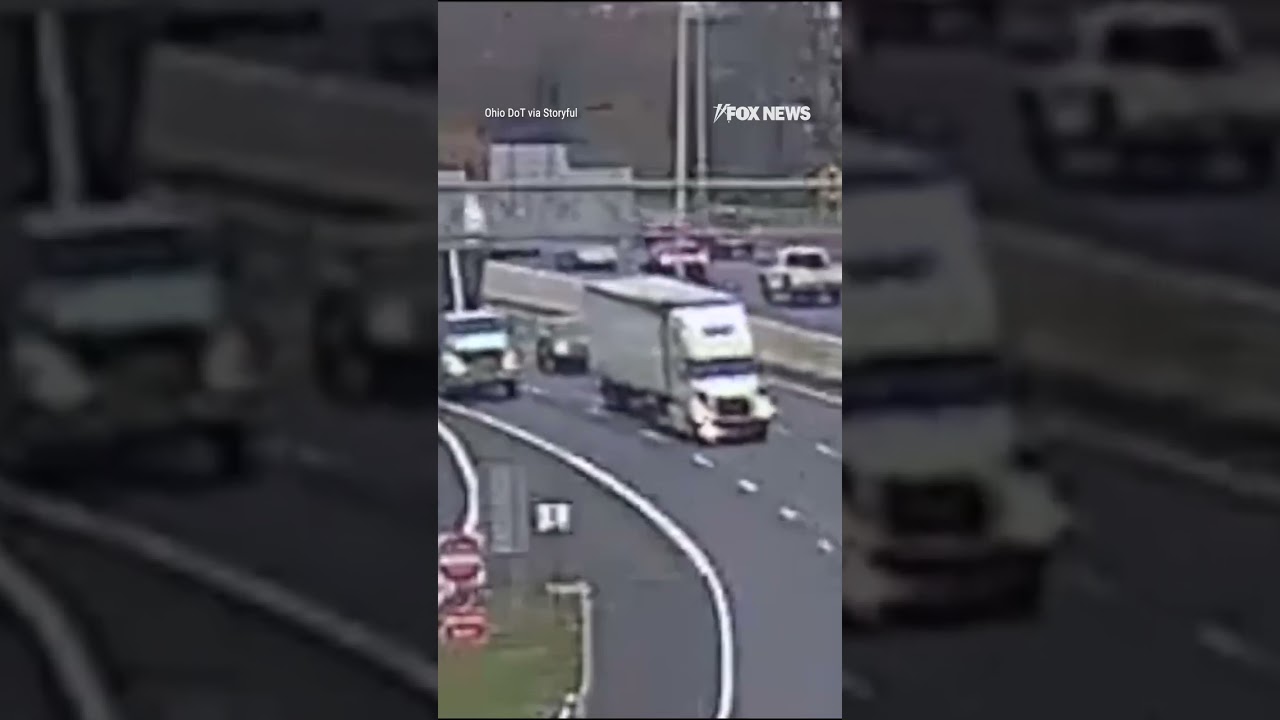 HIGHWAY HAZARD: A dump truck with its bed raised slams into two overhead signs #shorts #foxnews #fox