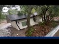 House carried away by floodwaters in Texas