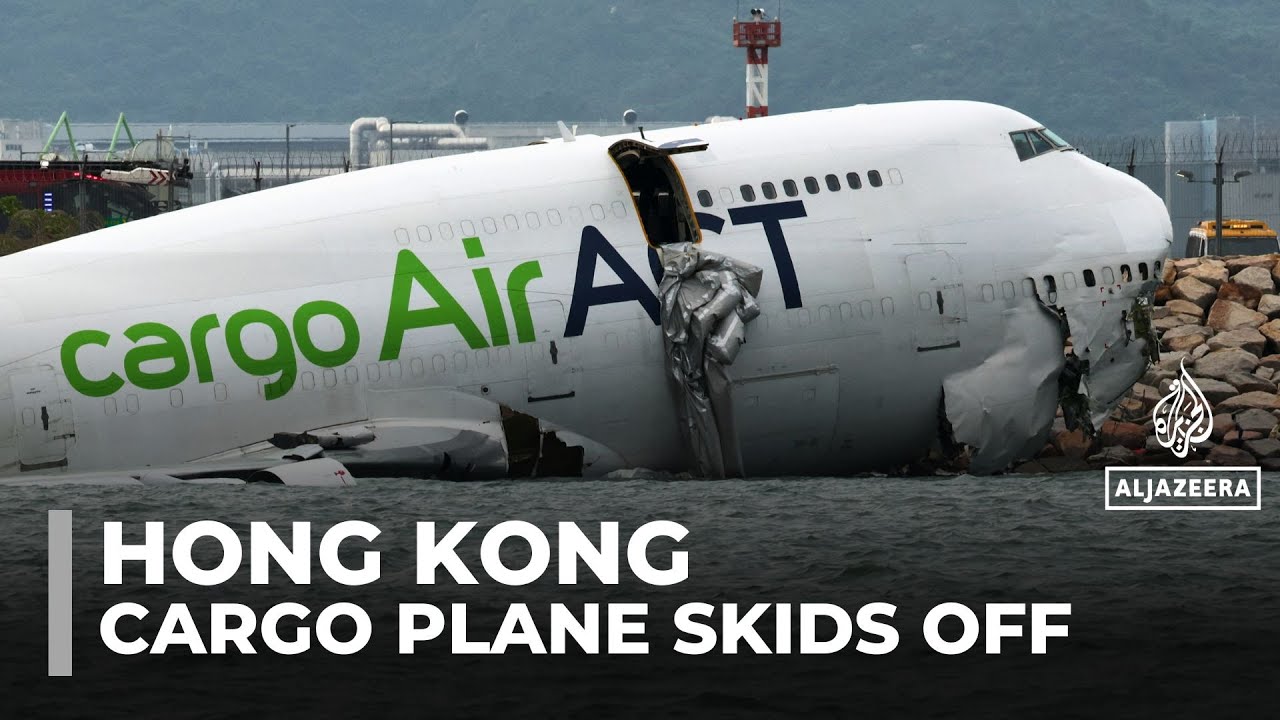 Two killed as cargo plane skids off Hong Kong runway