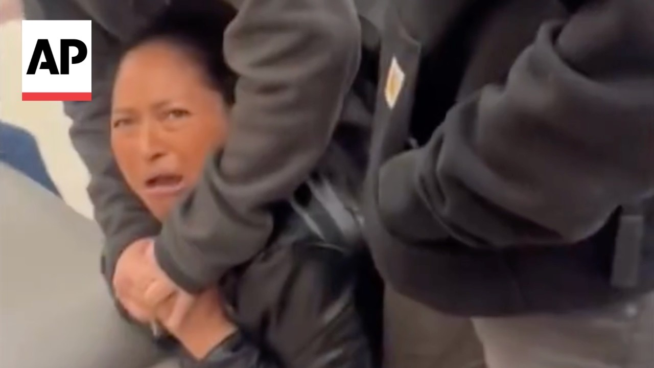 Video shows federal officers arresting crying woman at San Francisco airport