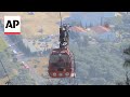 Rescuers help stranded people after deadly cable car accident in Turkey