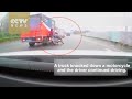 CCTV : Truck driver knocks motorbike, tries to flee