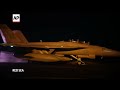 US fighter jets launch from aircraft carrier in Red Sea in support of strikes on Houthi sites - 00:20 min - News - Video