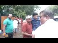Ram Gopal Yadav assisted to car as area around his residence is completely waterlogged
