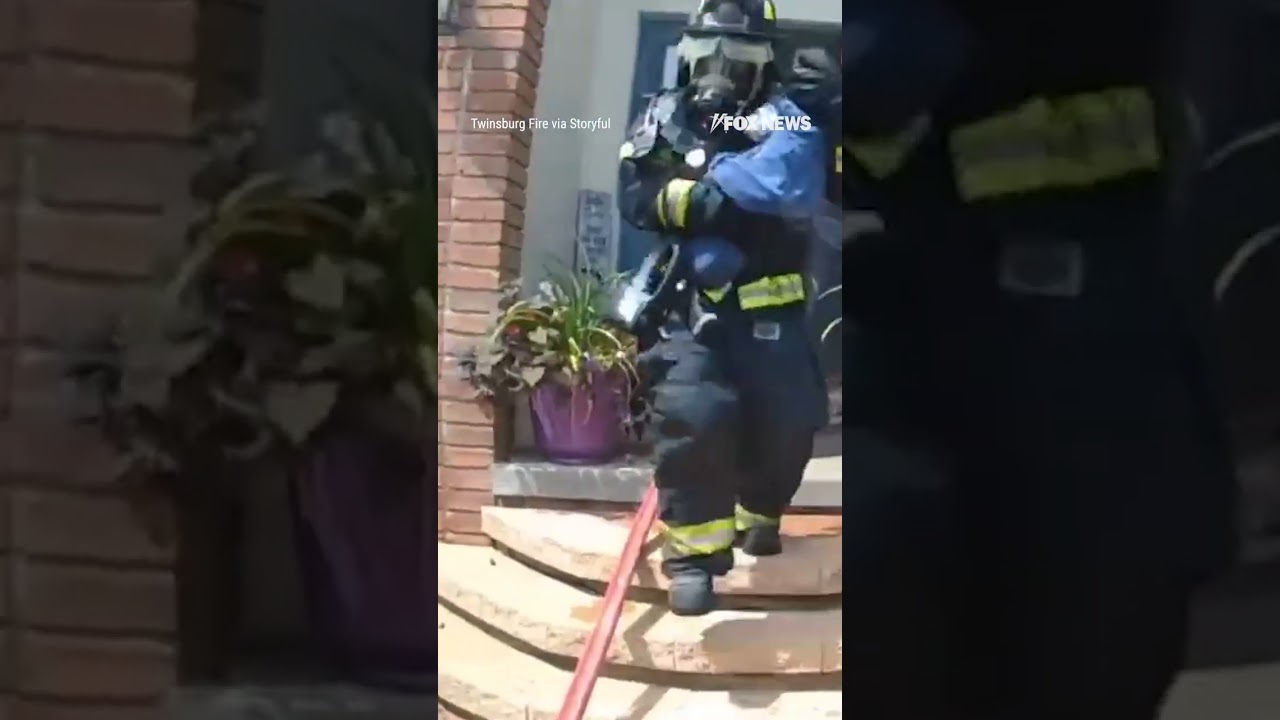 'BABY'S FINE': Dramatic footage shows a firefighter rescuing a baby #shorts #usa #us #viral