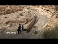Jewish Ultra-Orthodox families inspect debris of whats believed to be an intercepted Iranian surfac  - 00:54 min - News - Video
