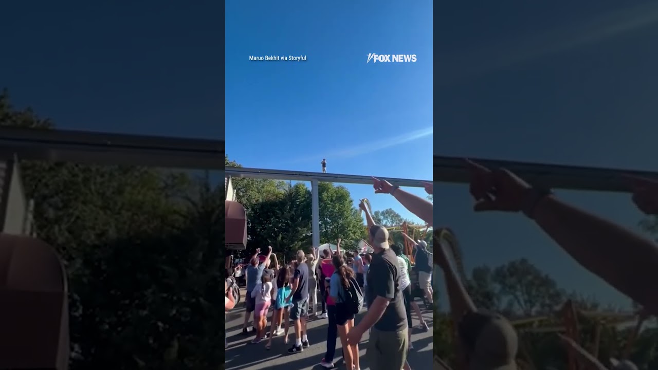 WATCH: Man rescues boy walking on monorail track #shorts