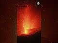 Mount Etna spews lava into night sky
