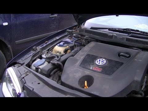 VW Golf IV - Windshield Washer Pump Removal