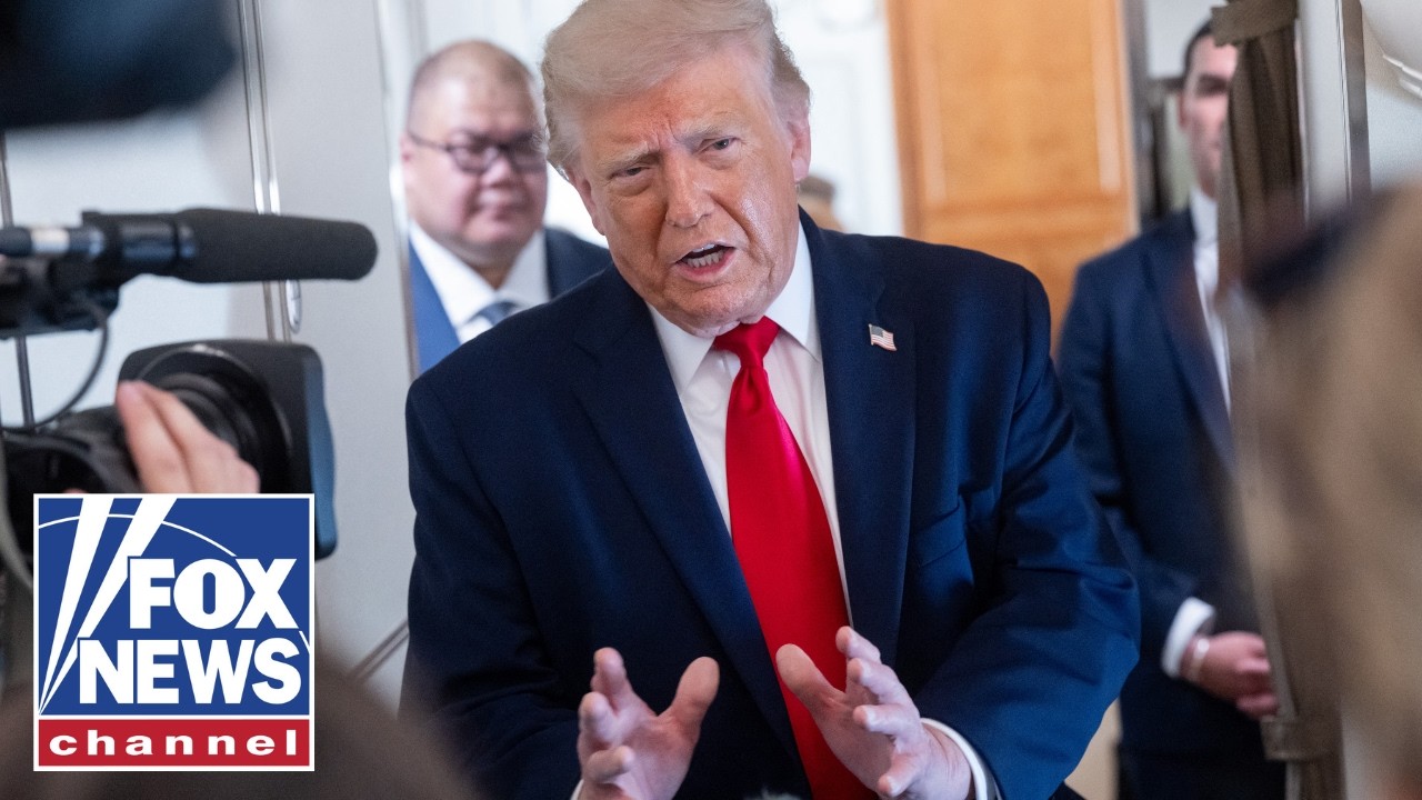 Trump signs Iran deal, defends against criticism of new memorandum
