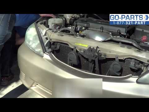 how to replace headlight bulb toyota camry 2003 #4