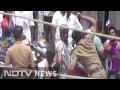 In video, 3 cops seen thrashing family as people watch