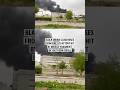 Black smoke cloud rises from fire at factory hit by missile fragment in southern Israel