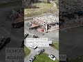 Drone footage shows school bus tossed onto gym from tornado - 00:48 min - News - Video