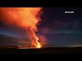 Timelapse shows Northern Lights shinning over erupting Iceland volcano  - 00:58 min - News - Video