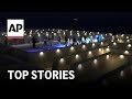 Aid trucks enter Gaza, AI maze installation at Miami Art Week, more: AP Top Stories
