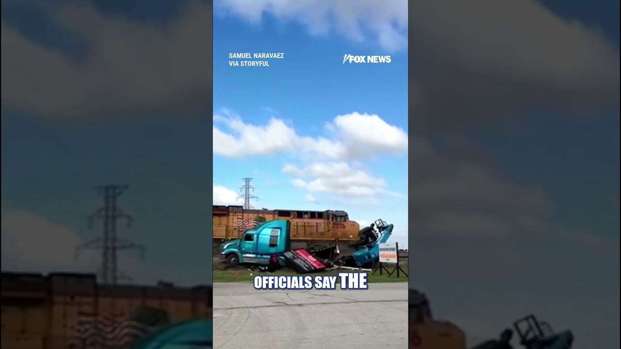 WATCH: Trucker NARROWLY escapes freight train CRASH #shorts #us #viral #crash
