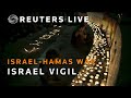 LIVE: Israelis hold a candlelight vigil to commemorate victims