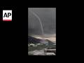 Spectacular waterspout forms on the coast of Italy