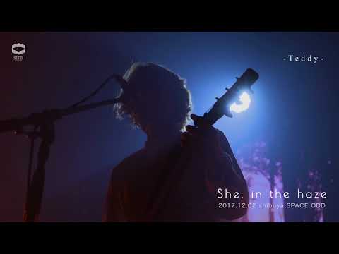 She, in the haze-