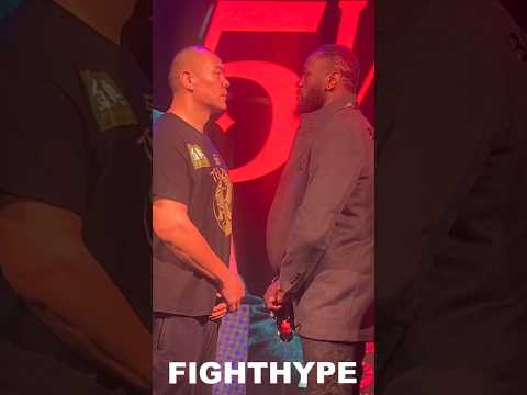 Deontay wilder stares down zhilei zhang with renewed bad intentions at first face off