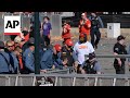 Father tackles armed person at Kansas City Chiefs parade
