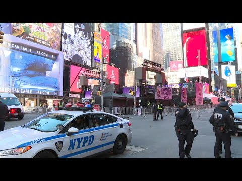 New York police stand watch in Times Square ahead of New Year's Eve celebrations | AFP