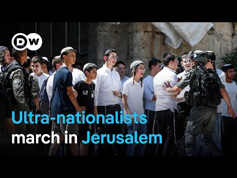 Ultra-nationalist Israelis scuffle with journalists and security forces at march in Jerusalem