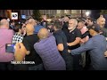 Supporters of ruling Georgian Dream party attack opposition rally in Tbilisi - 00:48 min - News - Video