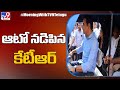 Minister KTR drives electric auto