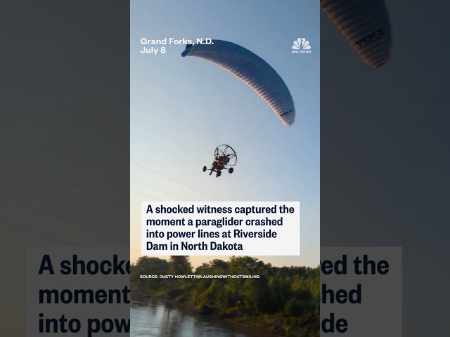 A shocked witness captured the moment a paraglider crashed into power lines in North Dakota