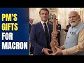 PM Modi presents sandalwood sitar and Pochampally Ikat to Macron and French First Lady